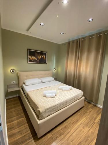 Postel nebo postele na pokoji v ubytování Novs Apartment3