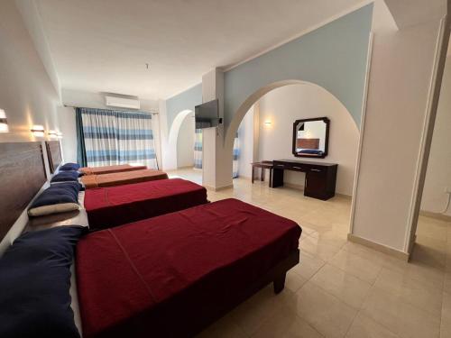 Postel nebo postele na pokoji v ubytování Hurghada Sea Apartments