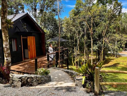Κήπος έξω από το Cabana romântica de Luxo com Ofurô