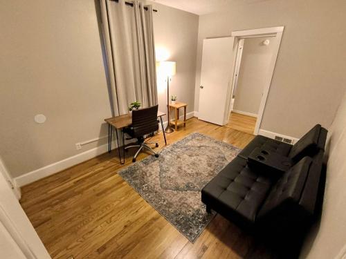 a living room with a couch and a table at Mins to USC Hospital Zoo Columbia Duet-Unit A in West Columbia