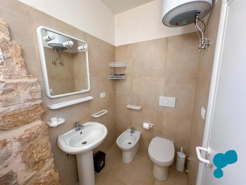 Ένα μπάνιο στο Trullo Nonnu Tore