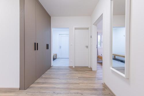 Postel nebo postele na pokoji v ubytování Apartmány u Josífka Velké Losiny