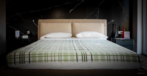 Ein Bett oder Betten in einem Zimmer der Unterkunft Casa Format
