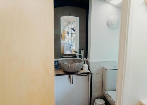a bathroom with a sink and a toilet at Mind The Gap in Preston