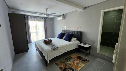 Katil atau katil-katil dalam bilik di Beachside Bliss Flic en Flac Beach