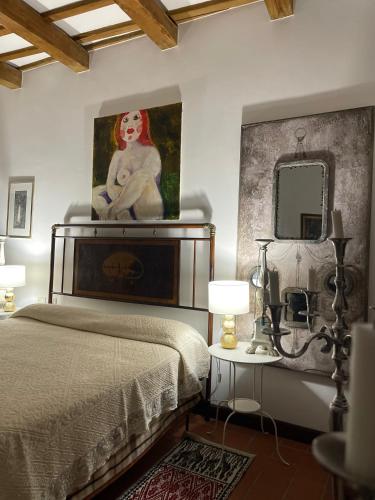 Il Borgo delle Sibille Albergo Diffusoにあるベッド