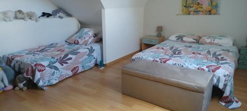 Ένα ή περισσότερα κρεβάτια σε δωμάτιο στο Chambre reposante