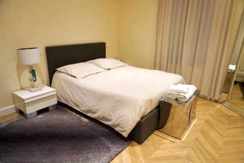Postel nebo postele na pokoji v ubytování Logement aux portes de Monaco