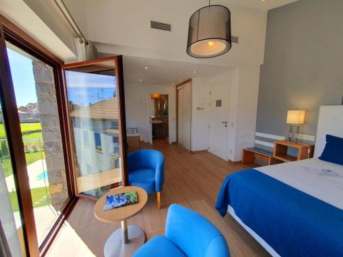 Katil atau katil-katil dalam bilik di Boutique Hotel Tierra Buxo - Adults Only