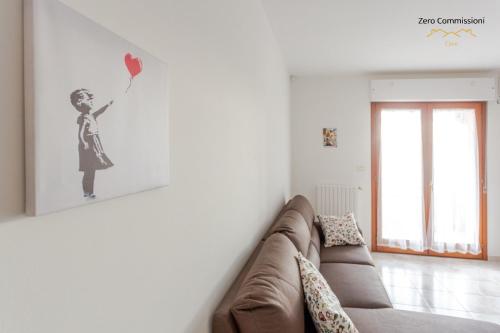 Posezení v ubytování Casa Pandolfi, appartamento 90mq con posto auto e aria condizionata
