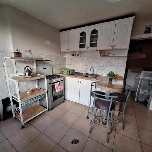 Kuchyň nebo kuchyňský kout v ubytování Casa Familiar entre nevados
