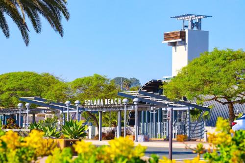 a parking lot with a gate and a control tower at Paradise Found! - SBTC336 in Solana Beach