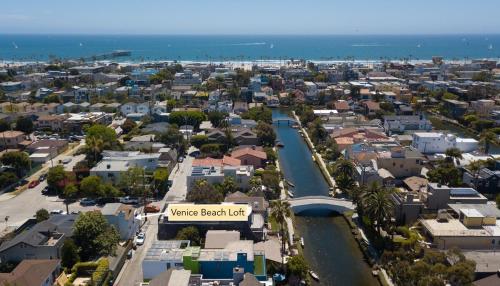 an aerial view of a city with a river at Private Venice Beach Loft - Steps to the Beach & Canals in Los Angeles