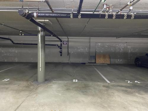 a garage with a parking lot with a pole at Relax & Renew - SONG8 in Solana Beach