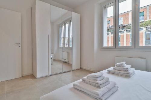 Ένα ή περισσότερα κρεβάτια σε δωμάτιο στο Arcos - 10 minutes walk to Piazza Maggiore