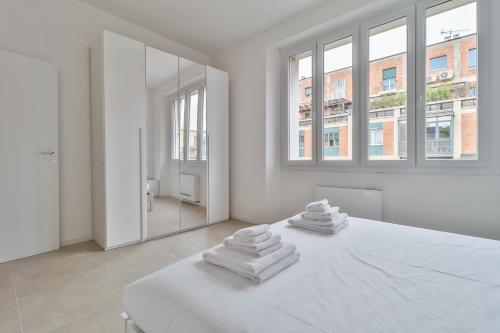 Ένα ή περισσότερα κρεβάτια σε δωμάτιο στο Arcos - 10 minutes walk to Piazza Maggiore