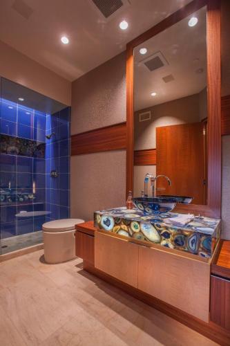 a bathroom with a tub and a sink and a toilet at Enchanting Oasis - SONG72 in Solana Beach