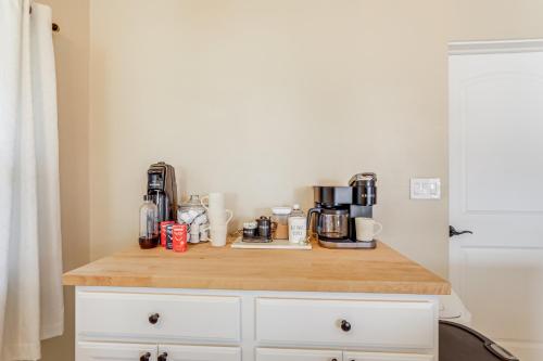 a kitchen counter with a coffee maker on it at 4 Mi to Historic Dtwn Venice Home with Heated Pool! in Venice