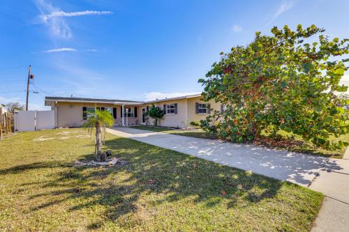 a house with a tree in the yard at 4 Mi to Historic Dtwn Venice Home with Heated Pool! in Venice