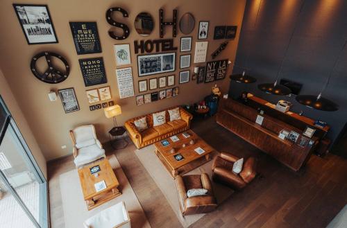 Cyan Soho Neuquén Hotelにあるシーティングエリア