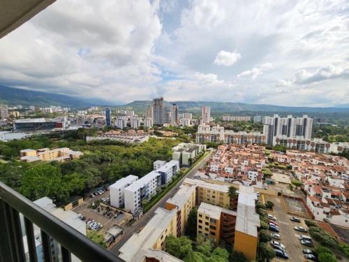 an aerial view of a city with buildings and cars at 1909 Luxury Cerca Clínica Foscal & Ardila Lulle in Floridablanca
