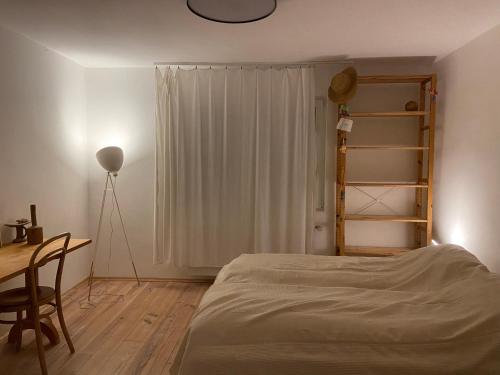 Postel nebo postele na pokoji v ubytování Ferienwohnung Kräutergarten