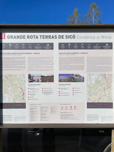 a television screen with a map on it at Pedra Oliveira in Ameixeira