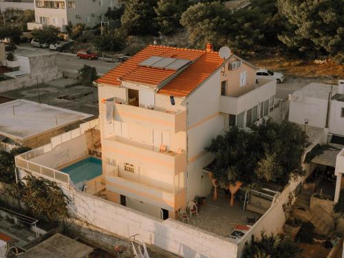 an aerial view of a house with a pool at Apartments Villa Bella Vista Hvar in Hvar