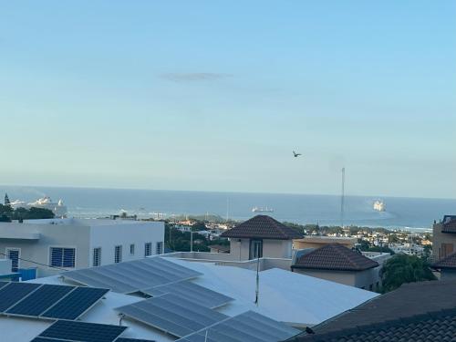a group of solar panels on the roofs of buildings at Luxury Villa Sunny BlueSky Ocean Mtn View in San Felipe de Puerto Plata