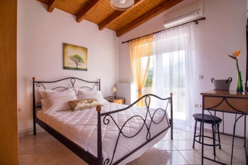 Postel nebo postele na pokoji v ubytování Villa Marianna