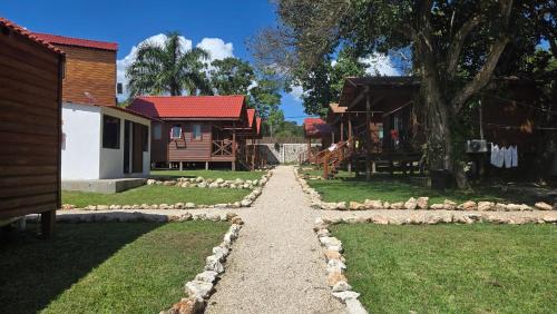 a path leading to a house and a house at bacalar My Love Front Laguna in Bacalar
