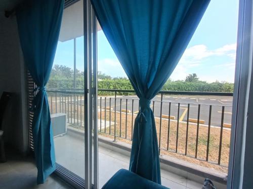 Un balcon sau o terasă la Apartamento vacacional Flandes Tolima