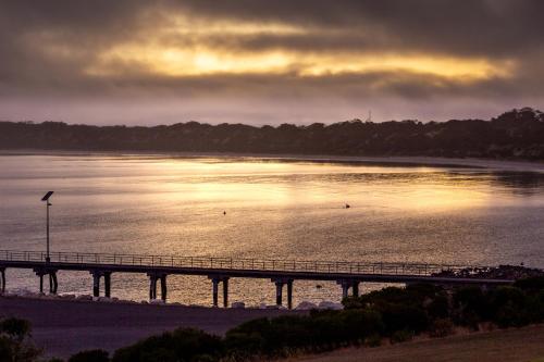 a bridge over a large body of water at Cactus- Spectacular Views On The Ocean Front Pet friendly in Emu Bay