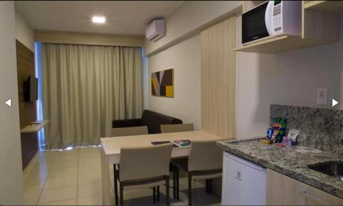 Cuisine ou kitchenette dans l'établissement Barretos Country Resort - Apto 1 Quarto até 5 Pessoas