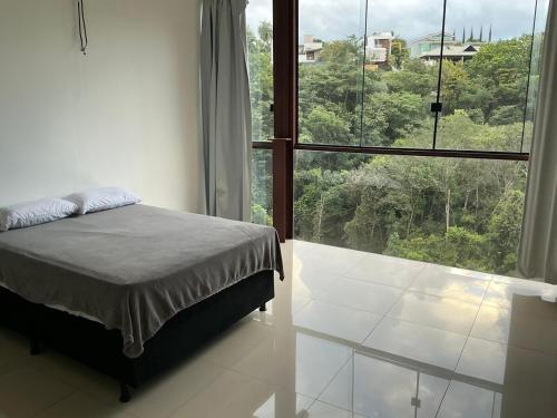 Postel nebo postele na pokoji v ubytování Casa Condominio de alto Padrao