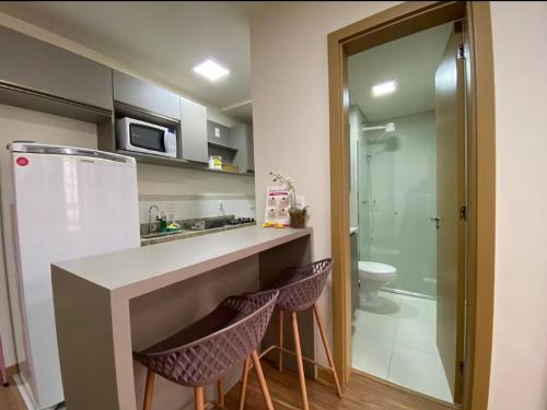 Dapur atau dapur kecil di Central, Ar Cond, WI-FI, Lava e Seca