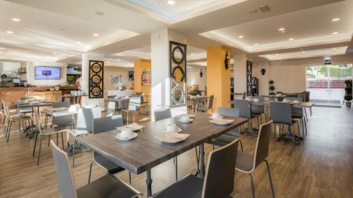 En restaurant eller et andet spisested på Boavista Fairviews Village