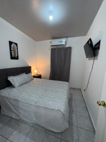 Llit o llits en una habitació de Casa Monaco