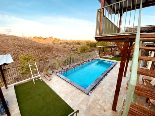 an overhead view of a swimming pool on a house at Ekas Beach View Villa in Labuan Lombok
