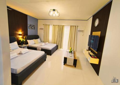 Cama o camas de una habitación en Puerto Princesa Spacious Family-Friendly Apartment - B1 7Kunzite