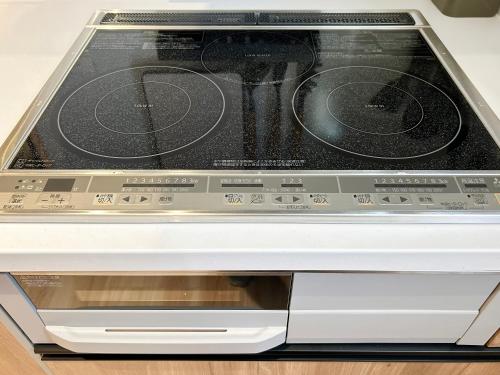 a toaster oven is sitting on a counter at nyans in Matsue
