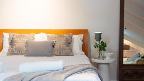 Ένα ή περισσότερα κρεβάτια σε δωμάτιο στο Fletchers Lane Retreat