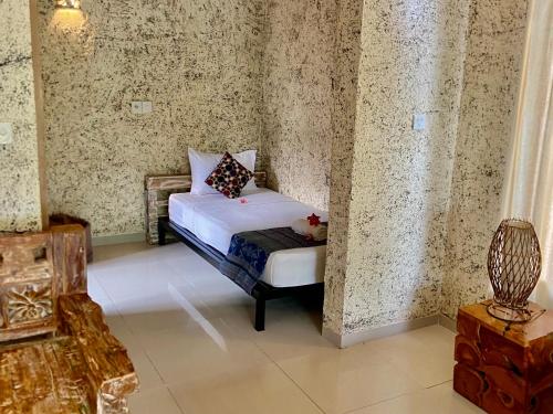 Cama o camas de una habitación en Baliwid Villa Ubud