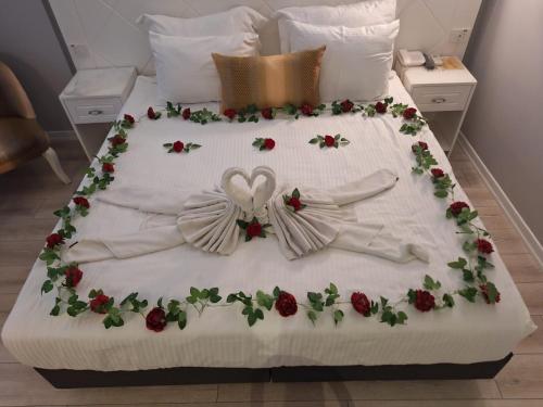 Ένα ή περισσότερα κρεβάτια σε δωμάτιο στο Motto Premium Hotel&Spa