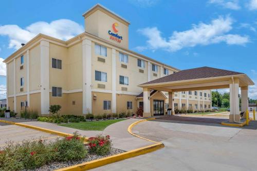 a hotel building with a gazebo in front of it at Comfort Suites Terre Haute University Area in Terre Haute