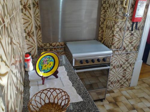 Kuchyň nebo kuchyňský kout v ubytování Apartment Rua Corpo de Deus in Coimbra