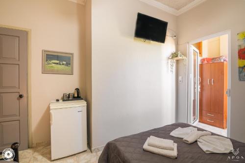 Posteľ alebo postele v izbe v ubytovaní Bikakis Family Apartments