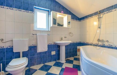 Kúpeľňa v ubytovaní Apartments Villa Ohana