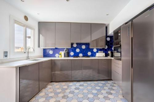 Kuchyň nebo kuchyňský kout v ubytování The Collection Barcelona - Amazing 3 bedroom penthouse in Plaza España