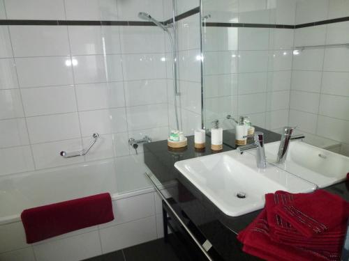 Koupelna v ubytování Hotel Enjoy
